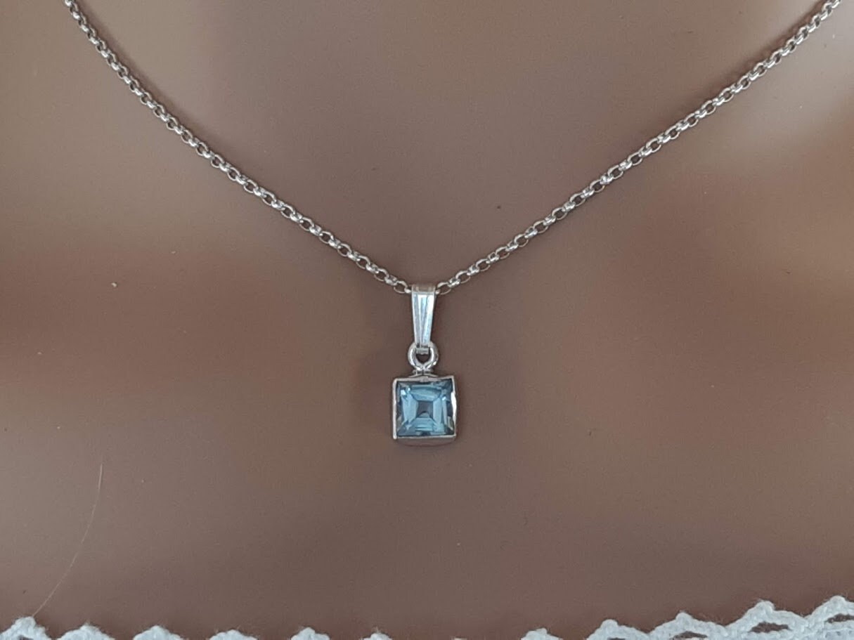 Blue topaz pendant, square faceted gemstone set in 92.5 sterling silver