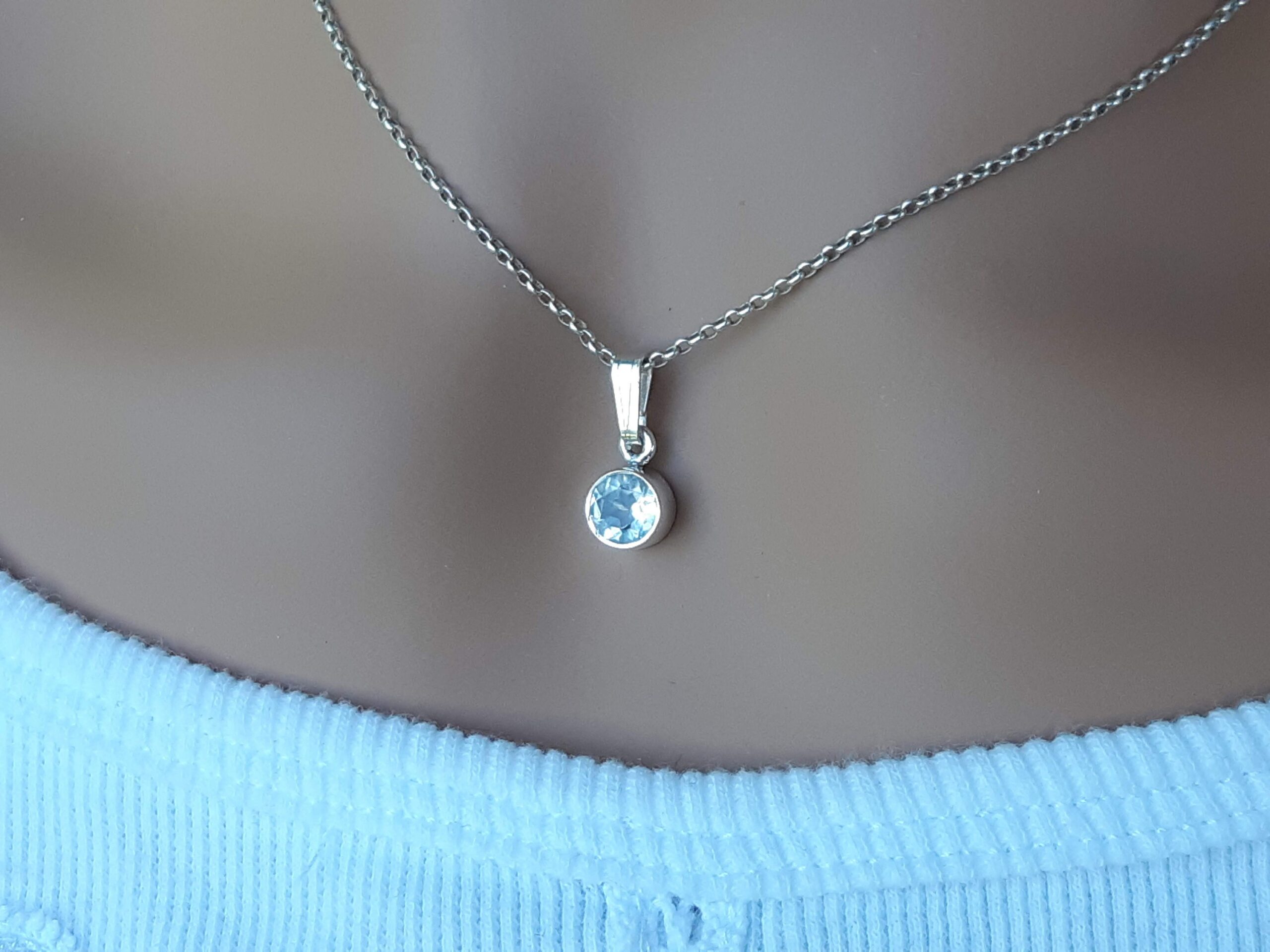 Faceted crystal quartz pendant Set In 92.5 sterling silver
