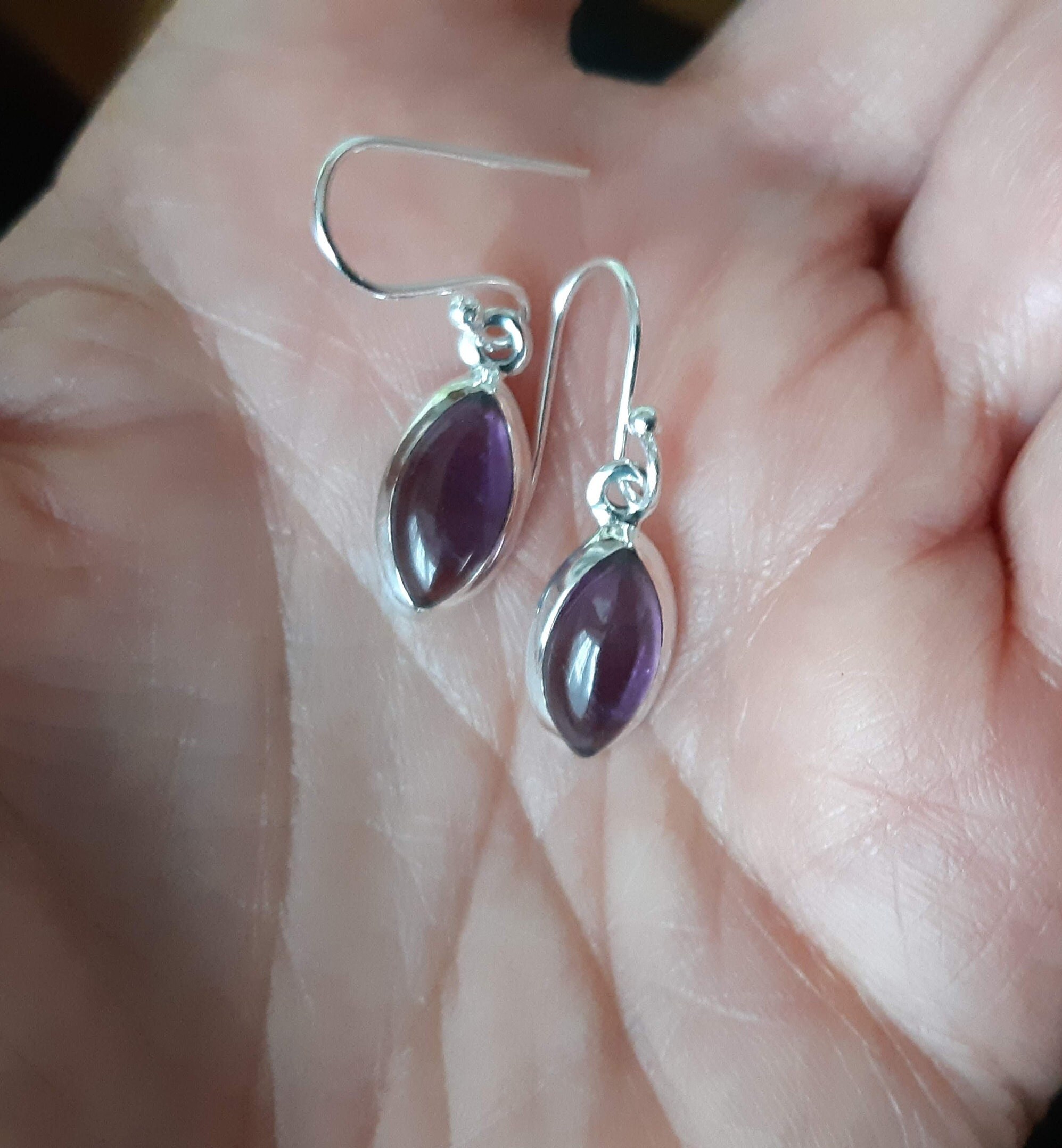 Amethyst marquise shape earrings set in 92.5 sterling silver