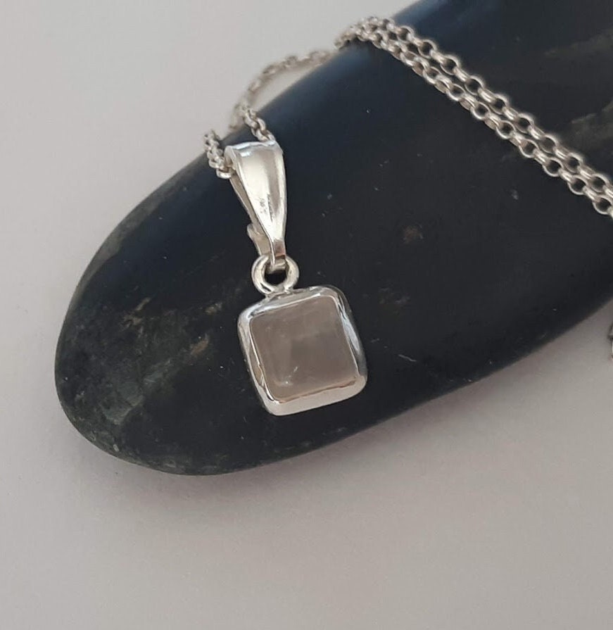 Small rose quartz pendant set in 92.5 sterling silver