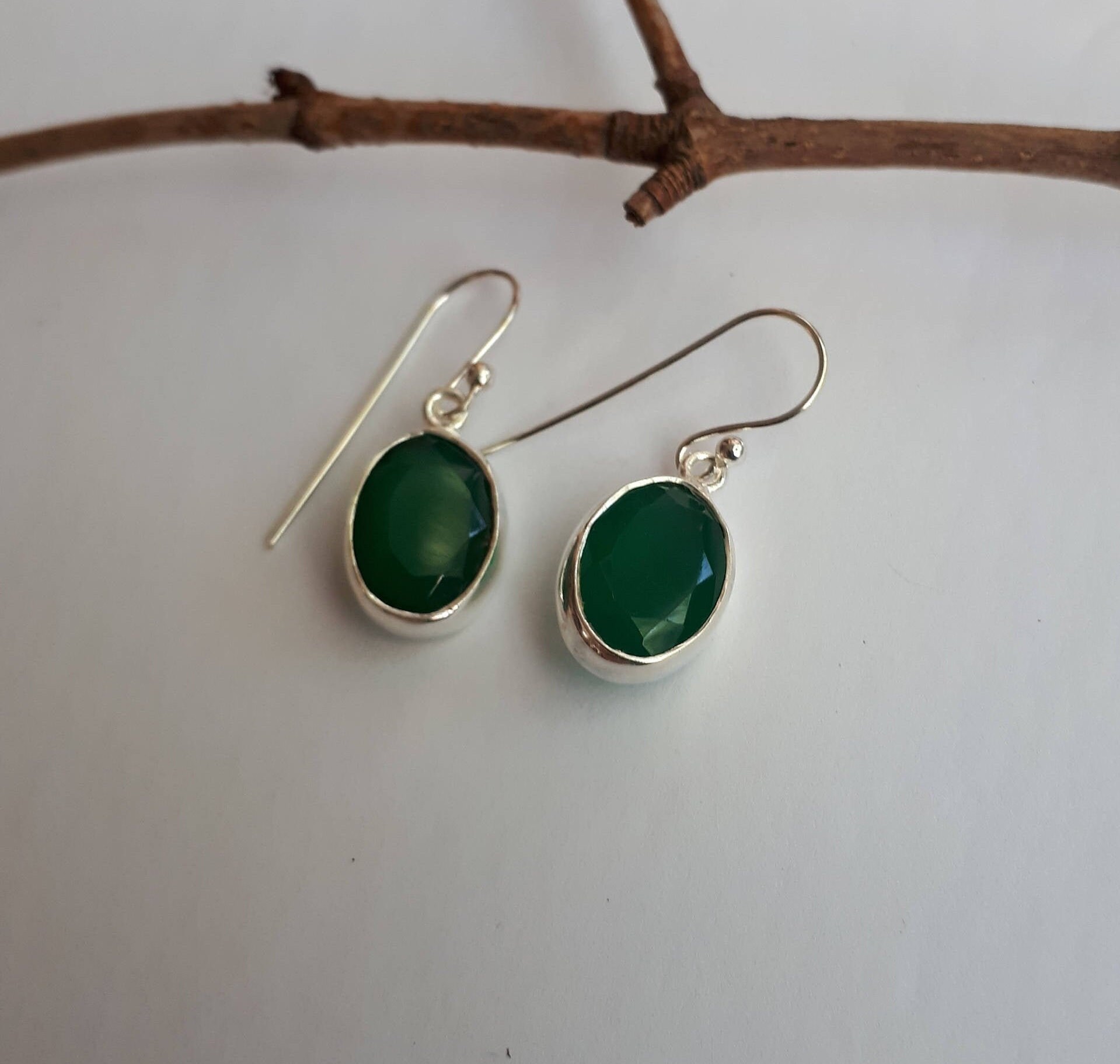Green onyx faceted earrings set in 92.5 sterling silver
