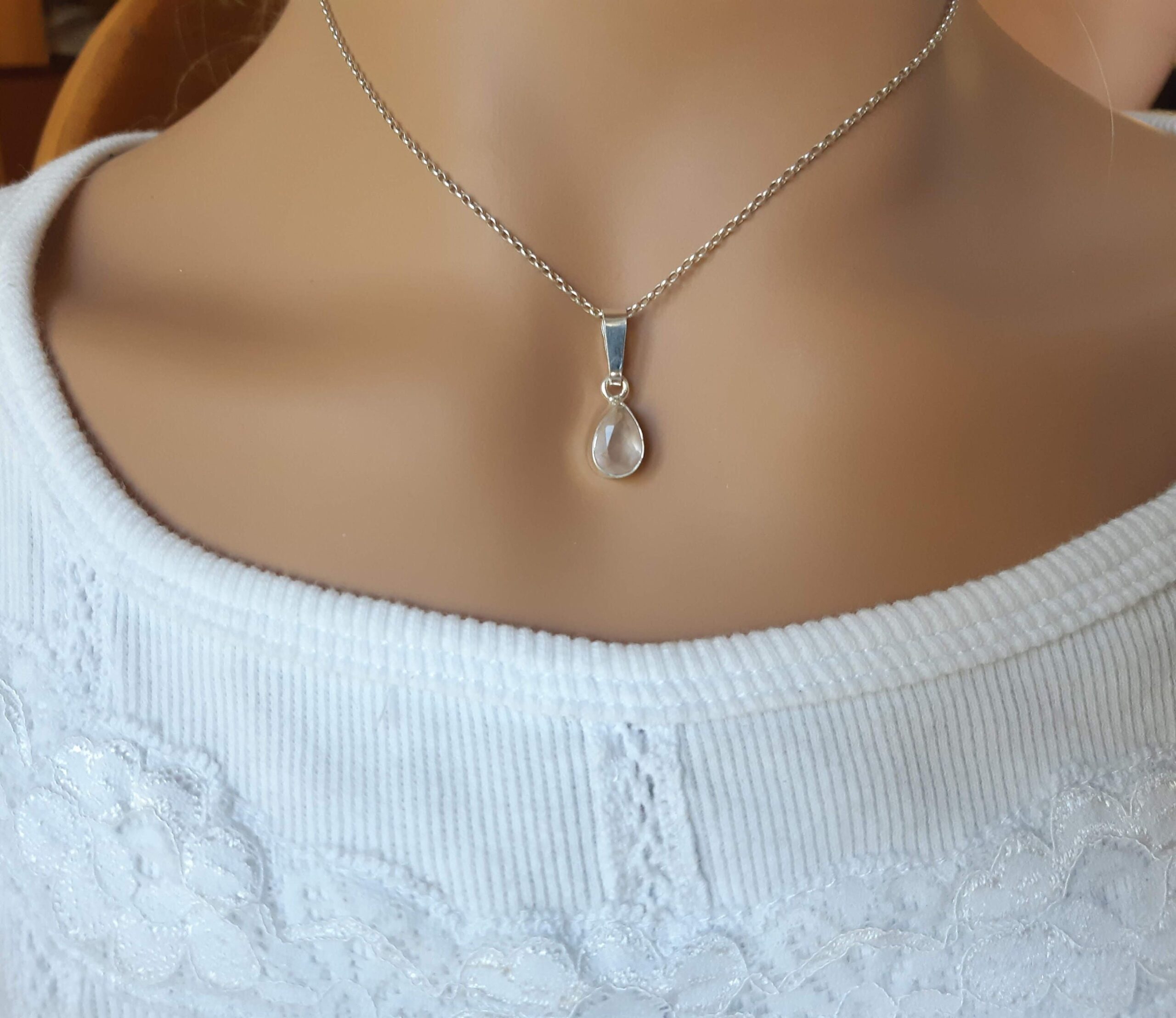 Rose quartz teardrop faceted gemstone pendant set in 92.5 sterling silver